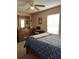 Relaxing bedroom features a dresser with mirror and natural light creating a comforting atmosphere at 203 Flounder Pl, Kissimmee, FL 34759