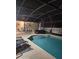 Sparkling pool with an outdoor dining area, perfect for relaxation and entertainment at 203 Flounder Pl, Kissimmee, FL 34759