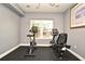 Exercise room featuring two stationary bikes and large window at 206 E South St # 1018, Orlando, FL 32801
