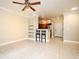 Bright living room with tile floors and an open kitchen area at 206 E South St # 1018, Orlando, FL 32801