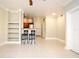 Bright living room with tile floors and a view to the kitchen at 206 E South St # 1018, Orlando, FL 32801