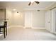 Inviting living room featuring tile flooring, neutral walls, and modern ceiling fan at 206 E South St # 1018, Orlando, FL 32801
