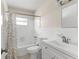 Clean bathroom with standard fixtures, tile flooring, and a shower-tub combination at 20639 Sw Rainbow Lakes Blvd, Dunnellon, FL 34431