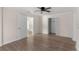 Spacious bedroom featuring a large closet, a ceiling fan, and neutral colored walls at 20639 Sw Rainbow Lakes Blvd, Dunnellon, FL 34431