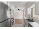 Kitchen space featuring stainless appliances, marble style countertops, and bright walls at 20639 Sw Rainbow Lakes Blvd, Dunnellon, FL 34431