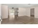 The open-concept living space features laminate flooring and abundant natural light at 20639 Sw Rainbow Lakes Blvd, Dunnellon, FL 34431