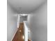 Hallway featuring wood floors and neutral paint at 2722 Dodds Ln, Kissimmee, FL 34743