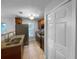 Functional kitchen with tile flooring, stainless steel appliances, and granite countertops at 2722 Dodds Ln, Kissimmee, FL 34743