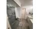 Bathroom featuring a spacious walk-in shower, toilet, and double sink vanity at 2831 S M U Blvd, Orlando, FL 32817