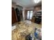 Well-appointed kitchen with granite counters, and a stainless steel refrigerator at 2831 S M U Blvd, Orlando, FL 32817