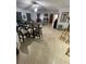 Spacious living room with tile flooring and a cozy seating arrangement at 2831 S M U Blvd, Orlando, FL 32817