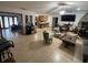 Bright, open-concept living area featuring tile floors and an abundance of natural light at 2831 S M U Blvd, Orlando, FL 32817