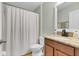 Bathroom featuring a shower, a sink with granite countertops, and vanity with cabinets at 3320 Grande Heron Dr, Harmony, FL 34773