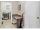 Functional laundry area with modern stainless steel washer and dryer and convenient folding counter space at 3320 Grande Heron Dr, Harmony, FL 34773