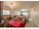 Spacious living room with tiled floors and large windows at 3797 Briarwood Estates Cir, St Cloud, FL 34772