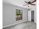 Bedroom with vinyl floors, ceiling fan, and a closet at 509 Nicole Blvd, Ocoee, FL 34761