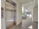 Convenient elevator access with a view to a landscaped walkway enhancing accessibility within the building at 535 N Interlachen Ave # 107, Winter Park, FL 32789