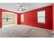 Large bedroom with carpet, ceiling fan, and natural light from large windows at 625 Silverthorn Pl, Groveland, FL 34736