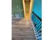 Hallway with wood flooring and wrought iron stair railing at 625 Silverthorn Pl, Groveland, FL 34736