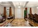 Spacious foyer with tile flooring, a decorative rug, and views into adjacent living areas at 7135 Ticklegrass St, Winter Garden, FL 34787