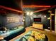 Themed bedroom featuring two twin beds, a TV, and playful decor for a fun and immersive experience at 7568 Marker Ave, Kissimmee, FL 34747