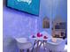 Whimsical playroom featuring a ' kitchen, entertainment unit, and playful decorations at 7568 Marker Ave, Kissimmee, FL 34747