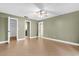Spacious bedroom with tile flooring, a ceiling fan, and a walk-in closet at 769 Dunlap Cir, Winter Springs, FL 32708