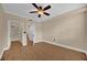 Spacious bedroom with tile floors and multiple entrances, including a closet at 911 N Orange Ave # 104, Orlando, FL 32801