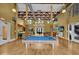 A spacious clubhouse featuring a billiard table and stylish decor, perfect for socializing and entertaining at 911 N Orange Ave # 104, Orlando, FL 32801