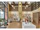 Reception area showcases built-in bookshelves, seating areas, and stylish decor creating a welcoming atmosphere at 911 N Orange Ave # 104, Orlando, FL 32801