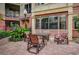 An inviting patio with a table and comfortable seating, ideal for outdoor dining and relaxation at 911 N Orange Ave # 104, Orlando, FL 32801