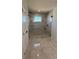 Modern bathroom with a frameless glass shower, and sleek fixtures at 917 Swallow St, Deltona, FL 32725