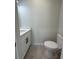Bathroom with modern vanity, fixtures and ceramic tile at 917 Swallow St, Deltona, FL 32725