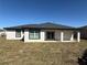 Beautiful home with a covered patio perfect for relaxing and enjoying the outdoors at 917 Swallow St, Deltona, FL 32725
