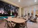 Beautiful screened lanai with outdoor dining area, lounge furniture, and swimming pool access at 10411 Hart Branch Cir, Orlando, FL 32832