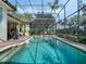 Stunning pool and patio area with a screened enclosure, providing a perfect outdoor retreat at 10411 Hart Branch Cir, Orlando, FL 32832
