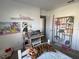 Bright bedroom featuring a writing desk with a hutch and a plush tiger at 11137 Lore Way, Orlando, FL 32832
