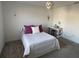 Bedroom featuring carpet, queen bed, and study desk at 11137 Lore Way, Orlando, FL 32832