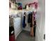 Walk-in closet features clothing rack, dresser and overhead shelving at 11137 Lore Way, Orlando, FL 32832