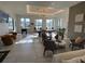 Spacious game room with a pool table, foosball table, lounge seating, and stylish decor at 11137 Lore Way, Orlando, FL 32832