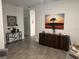 Bright living room with wood-look tile flooring and modern decor at 11137 Lore Way, Orlando, FL 32832