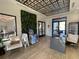 Lobby area with modern decor, unique ceiling design, and comfortable seating at 11137 Lore Way, Orlando, FL 32832