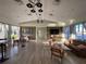 Inviting lounge with cozy seating, ample natural light, and a relaxed atmosphere at 11137 Lore Way, Orlando, FL 32832