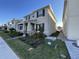 This two-story home boasts meticulous landscaping and well-maintained curb appeal, complementing its architectural design at 11137 Lore Way, Orlando, FL 32832