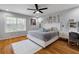 Cozy bedroom with hardwood floors, plush rug, and comfortable decor at 1500 Whitstable Ct, Lake Mary, FL 32746