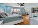 Stylish bedroom features a hanging chair, mirrored closet doors, and hardwood floors at 1500 Whitstable Ct, Lake Mary, FL 32746