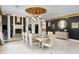 View of a dining room featuring a decorative ceiling and a fireplace, perfect for entertaining at 1500 Whitstable Ct, Lake Mary, FL 32746