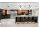 Open concept kitchen and dining area with large island and seating, perfect for entertaining at 1500 Whitstable Ct, Lake Mary, FL 32746