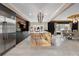 Modern kitchen featuring stainless steel appliances, a central island, and sleek cabinetry at 1500 Whitstable Ct, Lake Mary, FL 32746
