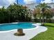Backyard pool surrounded by lush landscaping at 1511 Leeway Ave, Orlando, FL 32810